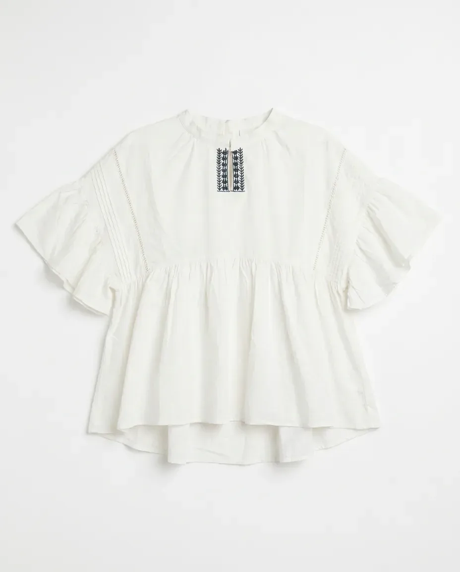 Ivory Embroidered Peplum Top